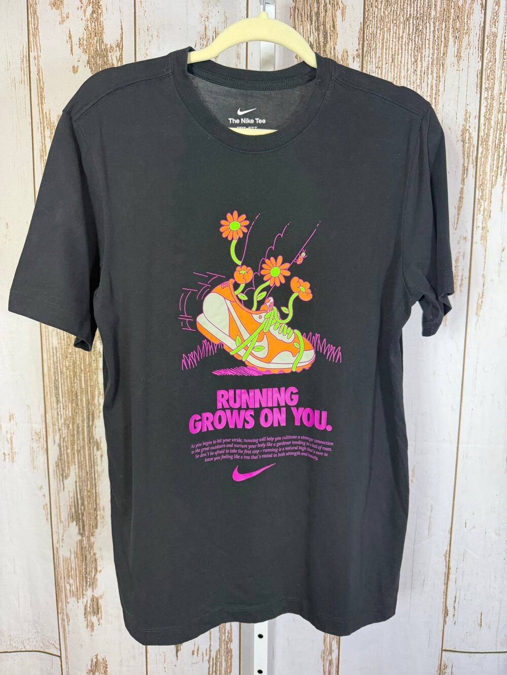 The Nike Tee, Dri Fit Running Grows on you Graphic T-Shirt. Size Medium.